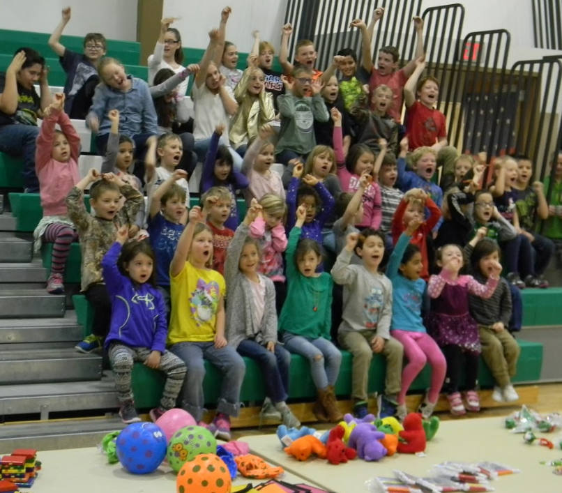 students celebrating during the assembly