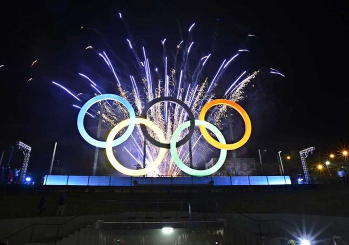 Olympic rings with fireworks